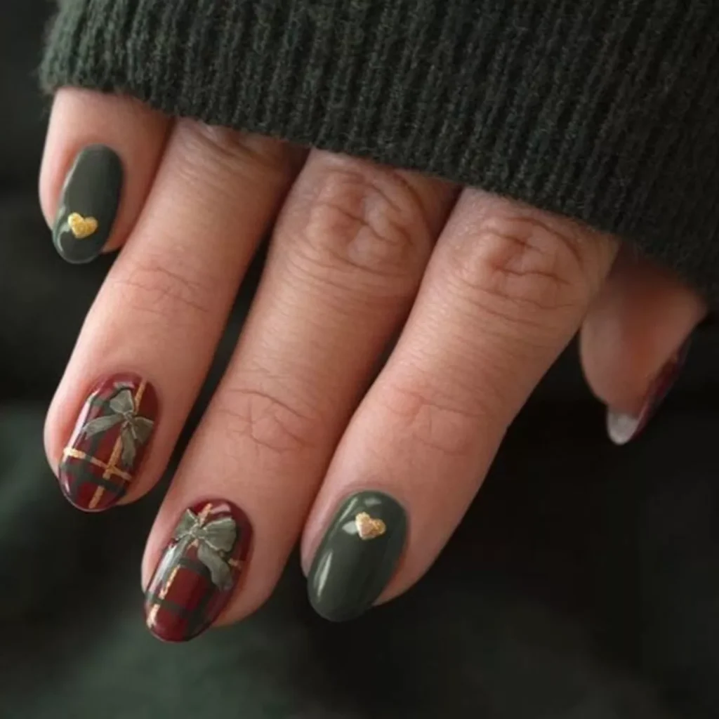 red and gold nails design with festive detailing