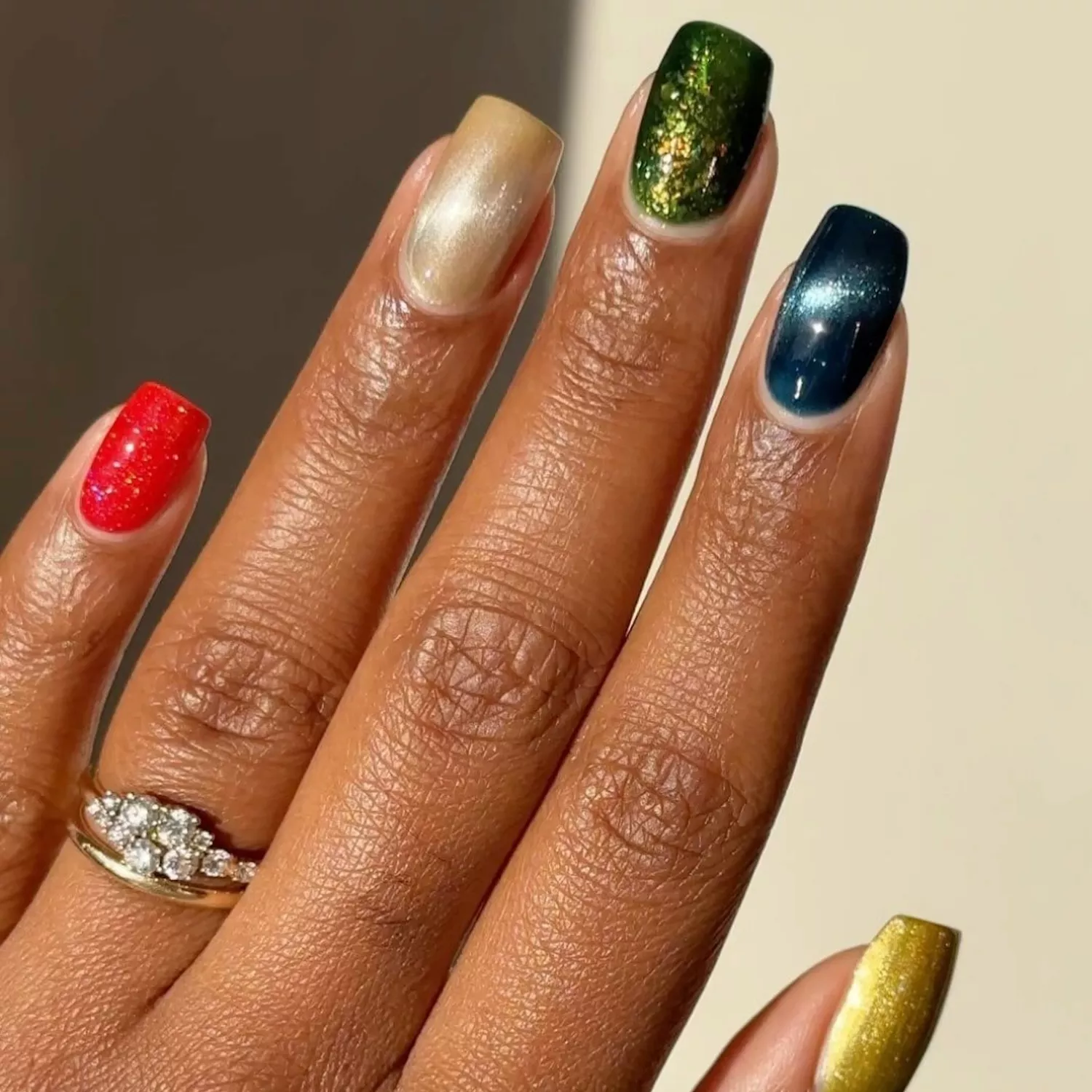 bold red and green manicure